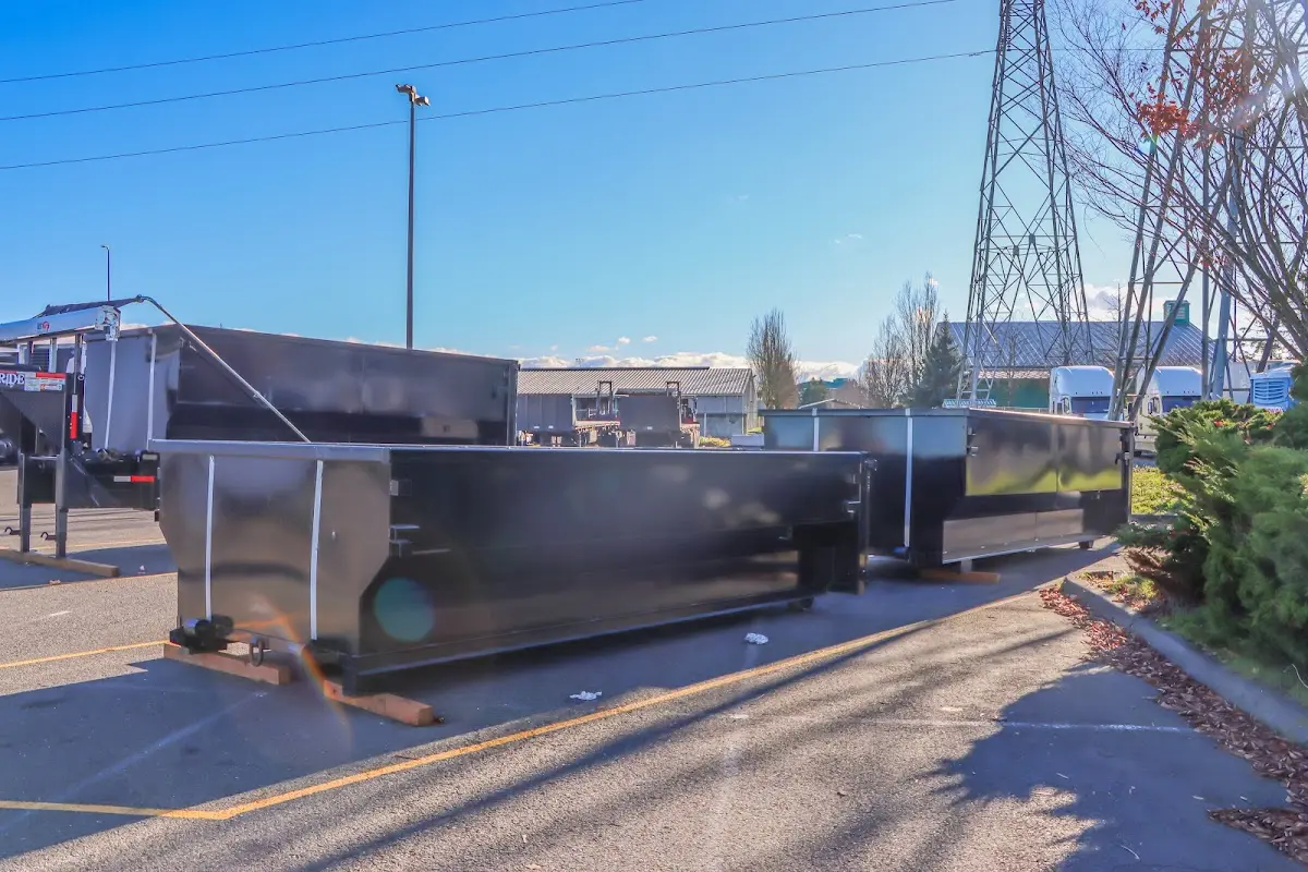 Roll-off dumpster ready for waste disposal at job site for Concrete Dumpster Rental in Marion